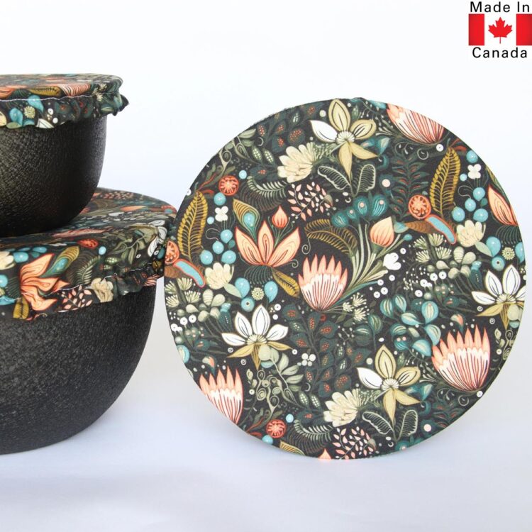 Set of 3 fabric bowl covers with a peach and turquoise floral pattern.