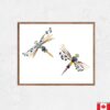 an art print of two dragonflies made from pressed florals.