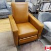 Recliner in a caramel colour leather. Boxy shape.