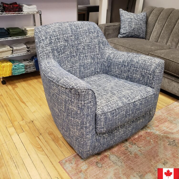 Blue and white accent chair with curved arms.