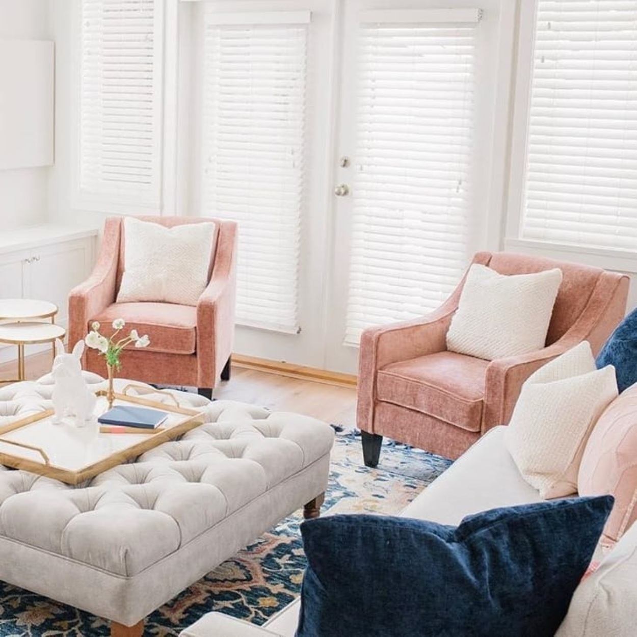 jenna-chair-com-1250sq Pale pink chairs with slim sloped arms.