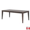Rectangular dining table with tapered leg in natural walnut.